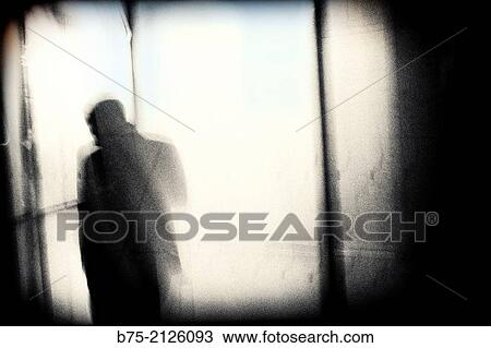 Silhouette of an unrecognizable man seen through a glass. London, England, UK View Large Photo Image Stock Image - Silhouette of an unrecognizable man seen through a glass. London, England, UK. Fotosearch