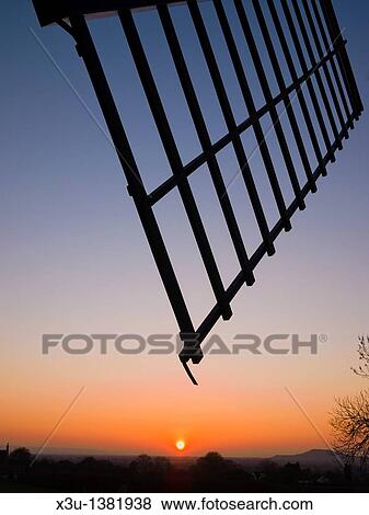 Silhouette of Ashton Windmill sail at sunset Chapel Allerton, Somerset, England, United Kingdom View Large Photo Image Stock Photo - Silhouette of Ashton Windmill sail at sunset Chapel Allerton, Somerset, England, United Kingdom. Fotosearch