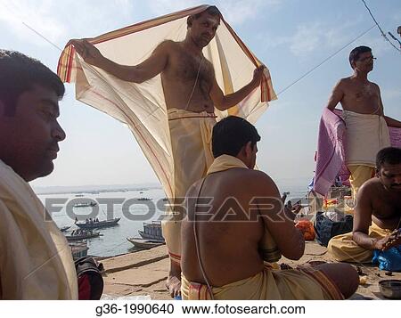 Stock Image - Silhouette of friends talking at fort in Jodhpur, Rajasthan, India.. Fotosearch