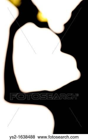 Silhouette of man drinking wine from a bottle View Large Photo Image Stock Photo - Silhouette of man drinking wine from a bottle. Fotosearch