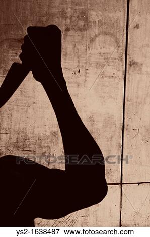 Silhouette of man with a knife in an urban setting View Large Photo Image Stock Photo - Silhouette of man with a knife in an urban setting. Fotosearch