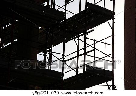 silhouette of scaffolding on building construction site View Large Photo Image Stock Image - silhouette of scaffolding on building construction site. Fotosearch