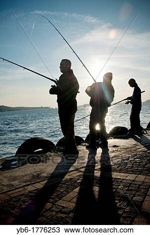 Silhouette of three Fishrmen at the Strait of Bosphorus, Istanbul, Turkey View Large Photo Image Stock Image - Silhouette of three Fishrmen at the Strait of Bosphorus, Istanbul, Turkey. Fotosearch