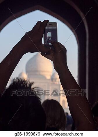 Silhouette of tourists at Taj Mahal in Agra, Uttar Pradesh, India. View Large Photo Image Stock Photo - Silhouette of tourists at Taj Mahal in Agra, Uttar Pradesh, India.. Fotosearch