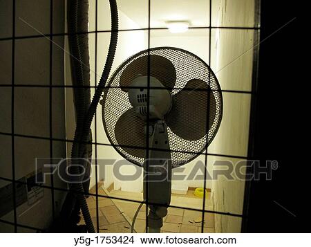 silhouette of ventilator fan in dark room at night View Large Photo Image Picture - silhouette of ventilator fan in dark room at night. Fotosearch