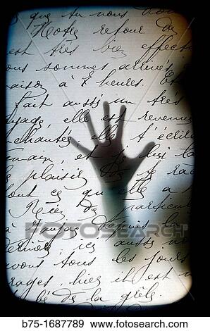 Silhouetted hand on handwritten text View Large Photo Image Stock Photo - Silhouetted hand on handwritten text. Fotosearch