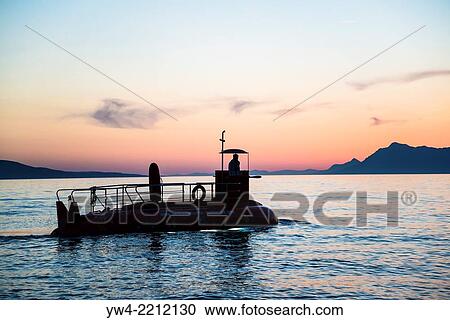 Silhouetted semi-submarine, Makarska, Croatia. View Large Photo Image Stock Image - Silhouetted semi-submarine, Makarska, Croatia.. Fotosearch