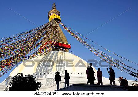 Stock Image - Silhouettes in front of the Bodnath stupa in Kathmandu. Nepal, Kathmandu, Bodnath.. Fotosearch