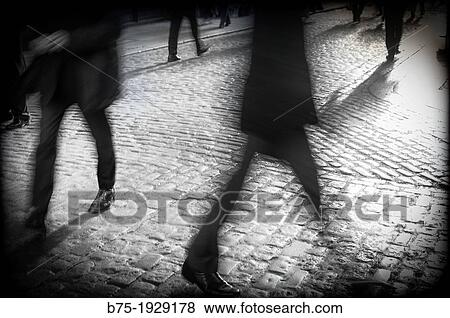silhouettes of people walking around town View Large Photo Image Stock Photo - silhouettes of people walking around town. Fotosearch