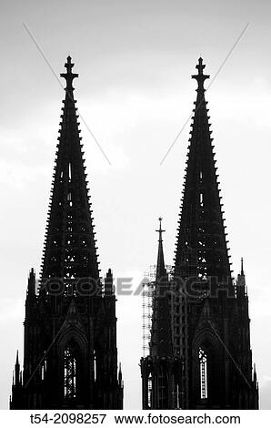 Silhouettes of the towers of Cologne Cathedral at dusk View Large Photo Image Stock Photo - Silhouettes of the towers of Cologne Cathedral at dusk. Fotosearch