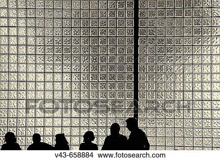 Silhouettes on glass wall, Barcelona. Catalonia, Spain View Large Photo Image Picture - Silhouettes on glass wall, Barcelona. Catalonia, Spain. Fotosearch