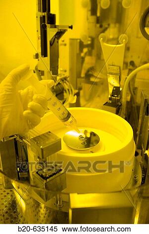 Silicon wafer. Spinner. Integrated circuits manufacture. Photolithography room. Clean room. Technology and Research Centre. Inasmet-Tecnalia Foundation, San Sebastian, Gipuzkoa, Euskadi. Spain. View Large Photo Image Stock Photography - Silicon wafer. Spinner. Integrated circuits manufacture. Photolithography room. Clean room. Technology and Research Centre. Inasmet-Tecnalia Foundation, San Sebastian, Gipuzkoa, Euskadi. Spain.. Fotosearch