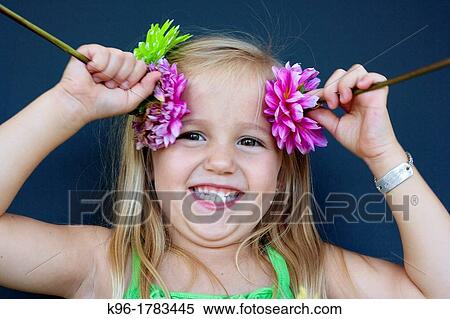 silly little girl playing with flowers View Large Photo Image Stock Photography - silly little girl playing with flowers. Fotosearch