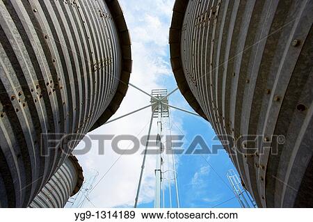 Silos of grain on a farm LLeida Spain View Large Photo Image Stock Photo - Silos of grain on a farm LLeida Spain. Fotosearch