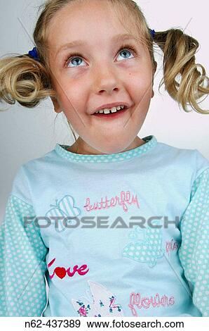 Simpering blond child. View Large Photo Image Stock Photo - Simpering blond child.. Fotosearch
