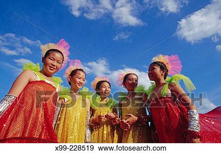 Singapore Chinese New Year, Mardis Gras. Chinese Children in Mardis Gras Costumes View Large Photo Image Stock Photo - Singapore Chinese New Year, Mardis Gras. Chinese Children in Mardis Gras Costumes. Fotosearch
