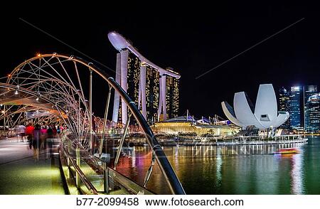 Singapore, night view of Marina Bay Sands, Art Science Museum and the Helix Bridge. View Large Photo Image Stock Photo - Singapore, night view of Marina Bay Sands, Art Science Museum and the Helix Bridge.. Fotosearch