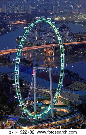 Stock Image - Singapore, Singapore Flyer, giant wheel,. Fotosearch