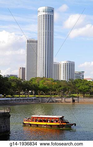 Singapore, Singapore River, Marina Bay, Swissotel The Stamford, hotel, skyscraper, water taxi, cruise boat, Marina Promenade, View Large Photo Image Picture - Singapore, Singapore River, Marina Bay, Swissotel The Stamford, hotel, skyscraper, water taxi, cruise boat, Marina Promenade,. Fotosearch