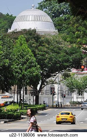 Stock Photograph - Singapore: street by the National Museum of Singapore. Fotosearch