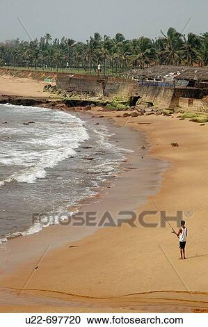 Stock Image - Sinquerim Goa, India: Sinquerim Beach, by Fort Aguada. Fotosearch