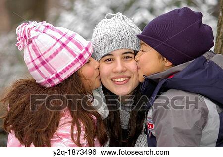 Sister and brother kissing Big sister View Large Photo Image Stock Photograph - Sister and brother kissing Big sister. Fotosearch