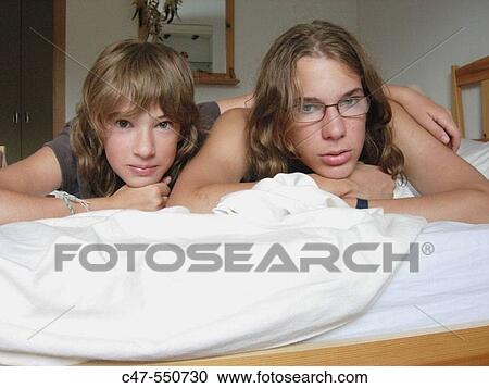Stock Image - Sister and brother. Fotosearch