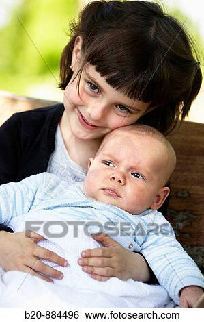 Stock Photograph - Sister and brother. Fotosearch