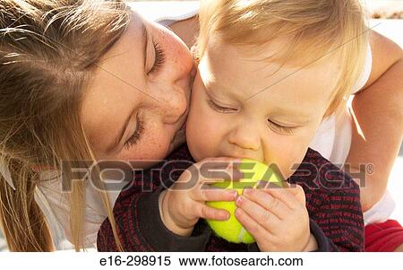 sister kissing brother View Large Photo Image Stock Photography - sister kissing brother. Fotosearch