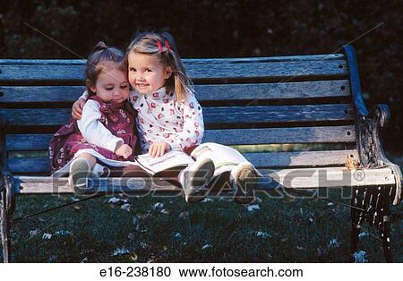 sisters reading View Large Photo Image Stock Image - sisters reading. Fotosearch