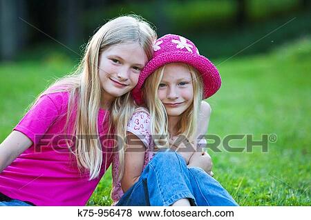 Stock Photo - sisters. Fotosearch
