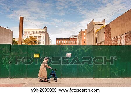 Stock Image - Site of future retail development on West 125th Street in Harlem in New York. Fotosearch
