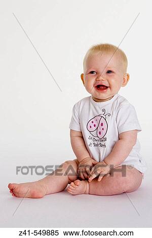 Stock Photography - Sitting baby.. Fotosearch