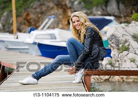 Stock Photography - Sitting low in the harbour. Fotosearch