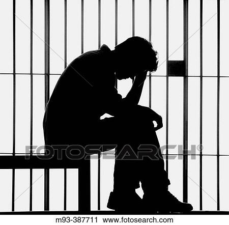 Sitting man. head in hand, silhouetted against jail bars. View Large Photo Image Stock Image - Sitting man. head in hand, silhouetted against jail bars.. Fotosearch