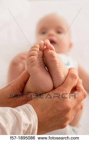 Six month old babies feet View Large Photo Image Stock Photograph - Six month old babies feet. Fotosearch