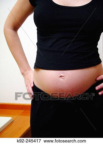 Six month pregnant woman. View Large Photo Image Stock Photo - Six month pregnant woman.. Fotosearch