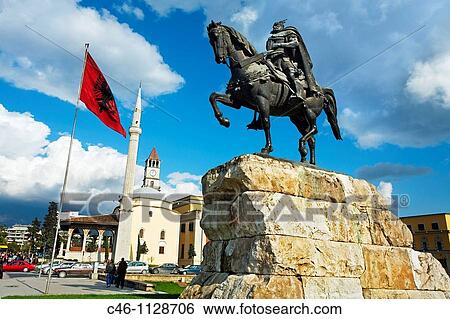 Skanderbeg monument and the mosque of Mirahori a Kor? a. Skanderbeg Square in Tirana. Albania. View Large Photo Image Stock Photograph - Skanderbeg monument and the mosque of Mirahori a Kor? a. Skanderbeg Square in Tirana. Albania.. Fotosearch