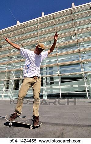 Skateboarder in Pla? a dels Pla? a dels? ngels in front of MACBA (Museum of Contemporary Art, 1987-95, designed by Richard Meier), Barcelona. Catalonia, Spain View Large Photo Image Stock Photography - Skateboarder in Pla? a dels Pla? a dels? ngels in front of MACBA (Museum of Contemporary Art, 1987-95, designed by Richard Meier), Barcelona. Catalonia, Spain. Fotosearch