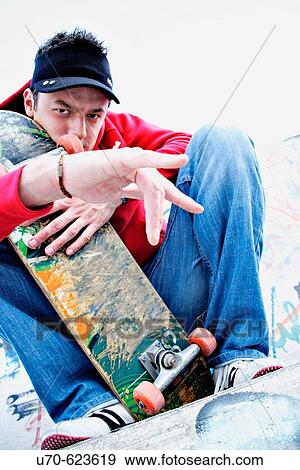 Skater taking a break View Large Photo Image Stock Photo - Skater taking a break. Fotosearch
