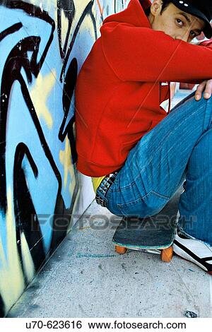 Skater taking a break View Large Photo Image Stock Photograph - Skater taking a break. Fotosearch