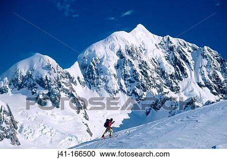 Ski mountaineer near the summit of Von Bulow peak. Mt. Tasman behind. Westland National Park. New Zealand View Large Photo Image Stock Image - Ski mountaineer near the summit of Von Bulow peak. Mt. Tasman behind. Westland National Park. New Zealand. Fotosearch