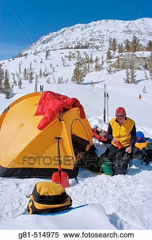 Skier and Yellow dome tent in a backcountry ski camp in Little Lakes Valley, Inyo National Forest, Sierra Nevada Mountains, California View Large Photo Image Stock Photography - Skier and Yellow dome tent in a backcountry ski camp in Little Lakes Valley, Inyo National Forest, Sierra Nevada Mountains, California. Fotosearch