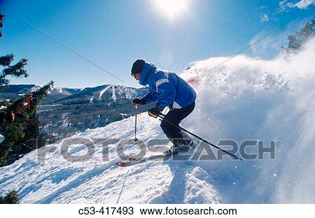 Skiing aggressive. Skiing tombstone at The Canyons. Utah. USA View Large Photo Image Stock Image - Skiing aggressive. Skiing tombstone at The Canyons. Utah. USA. Fotosearch