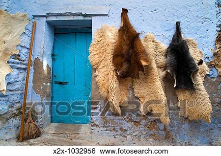 Skins on a typical house, Chefchaouen, Morocco View Large Photo Image Stock Photograph - Skins on a typical house, Chefchaouen, Morocco. Fotosearch