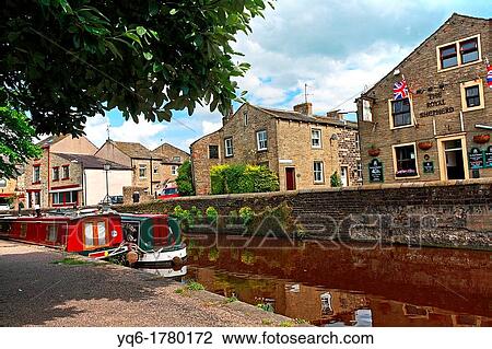 Skipton also known as Skipton-in-Craven is a market town and civil parish in the Craven district of North Yorkshire, England It is located on the course of the River Aire and the Leeds and Liverpool Canal to the south of the Yorkshire Dales, View Large Photo Image Stock Image - Skipton also known as Skipton-in-Craven is a market town and civil parish in the Craven district of North Yorkshire, England It is located on the course of the River Aire and the Leeds and Liverpool Canal to the south of the Yorkshire Dales,. Fotosearch