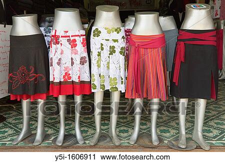 Skirts for sale in a clothes shop, Hoi An, Quang Nam Province, Vietnam View Large Photo Image Stock Image - Skirts for sale in a clothes shop, Hoi An, Quang Nam Province, Vietnam. Fotosearch