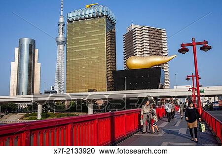 Sky Tree and Asahi building from Azuma bridge, Asakusa District, Tokyo, Japan. View Large Photo Image Stock Image - Sky Tree and Asahi building from Azuma bridge, Asakusa District, Tokyo, Japan.. Fotosearch