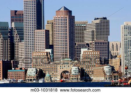 Skyline financial district Boston Massachusetts USA New England modern buildings contrast architecture city business Rowes Wharf ferry harbor boats water View Large Photo Image Stock Photo - Skyline financial district Boston Massachusetts USA New England modern buildings contrast architecture city business Rowes Wharf ferry harbor boats water. Fotosearch