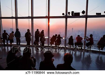 Skyline of Tokyo As seen from Mori Tower Tokyo city view, in Roppongi Hills Visitors Tokyo city, Japan, Asia View Large Photo Image Picture - Skyline of Tokyo As seen from Mori Tower Tokyo city view, in Roppongi Hills Visitors Tokyo city, Japan, Asia. Fotosearch